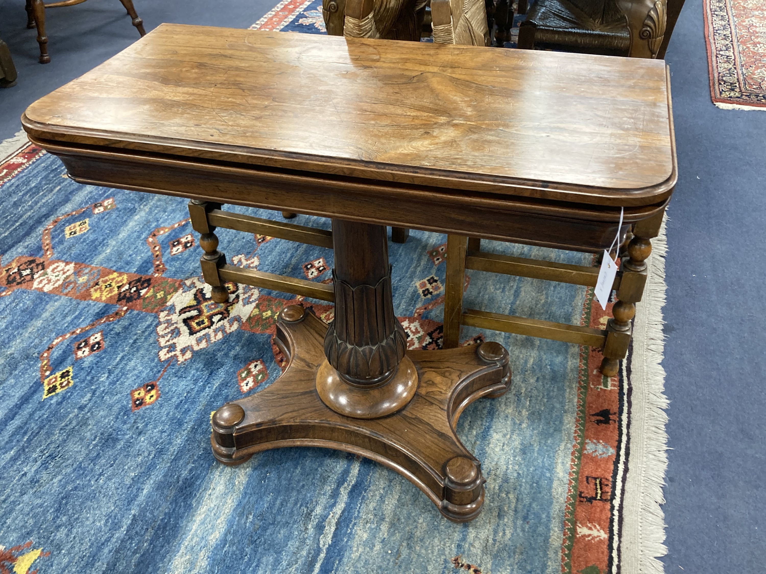 A Victorian rosewood folding card table, width 90cm, depth 45cm, height 75cm